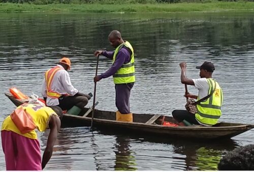 Searchers build embankment, begin diversion of water from crash site